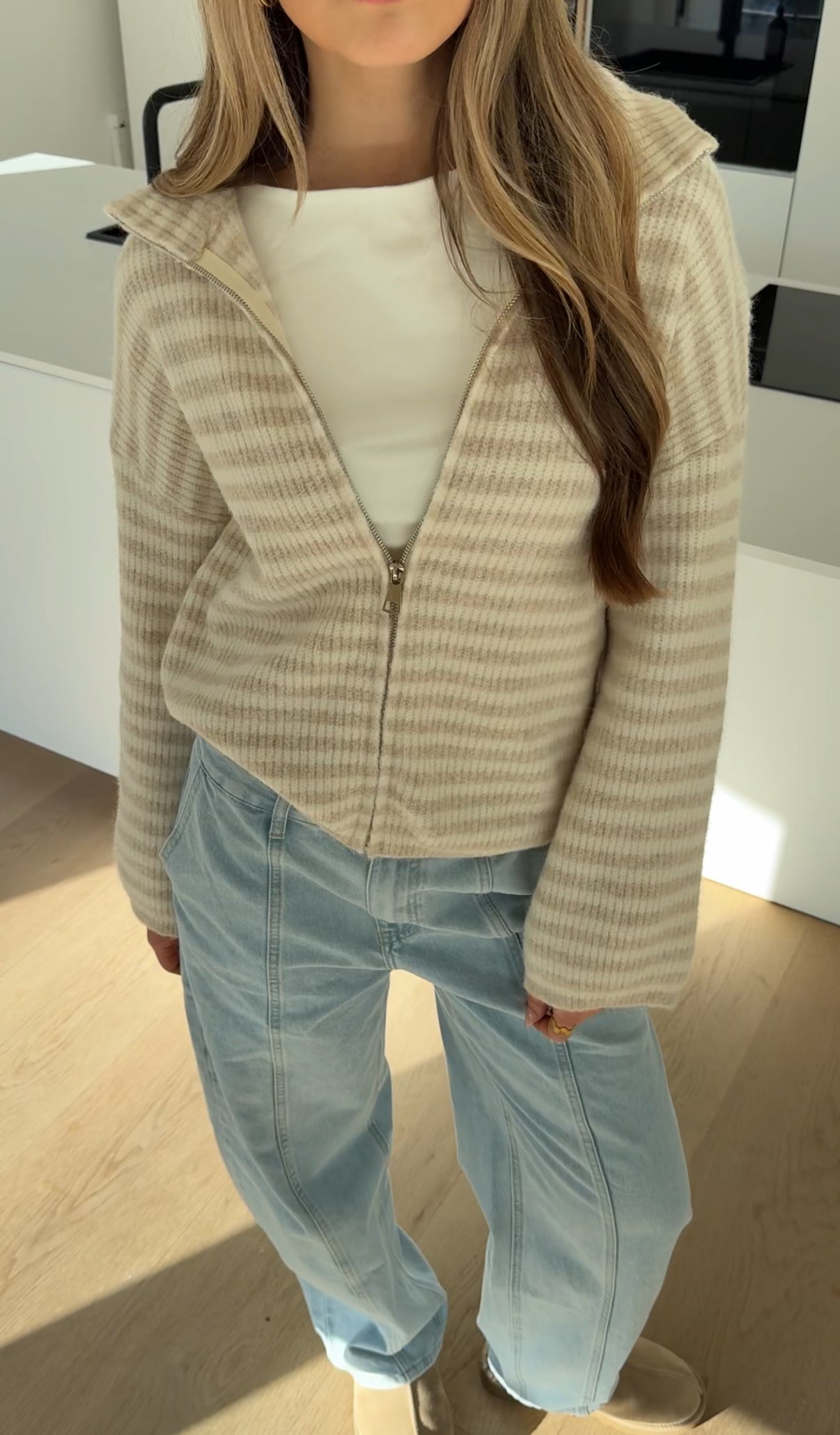 CÁRDIGAN DE PUNTO CON CREMALLERA A RAYAS