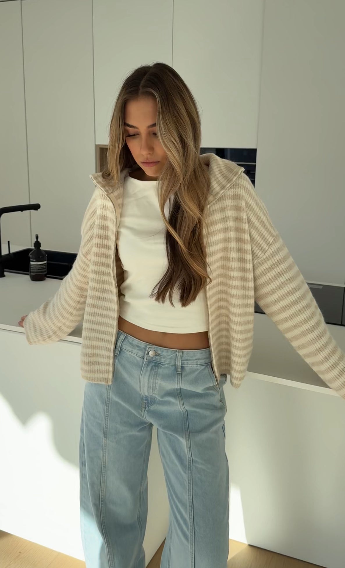 CÁRDIGAN DE PUNTO CON CREMALLERA A RAYAS